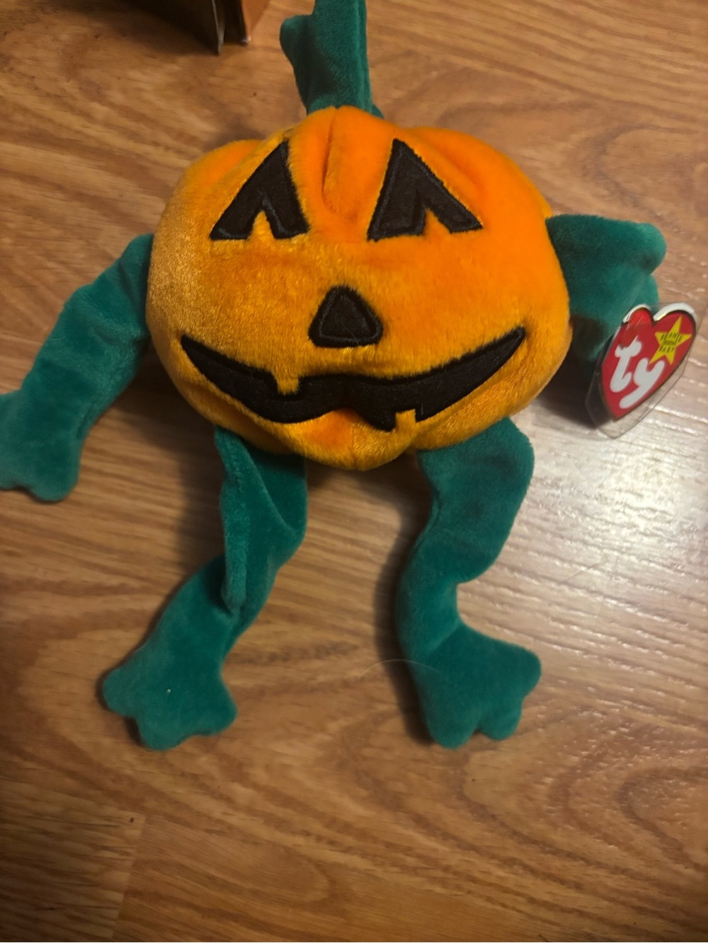 Ty Orange Pumpkin Plush with Green Limbs